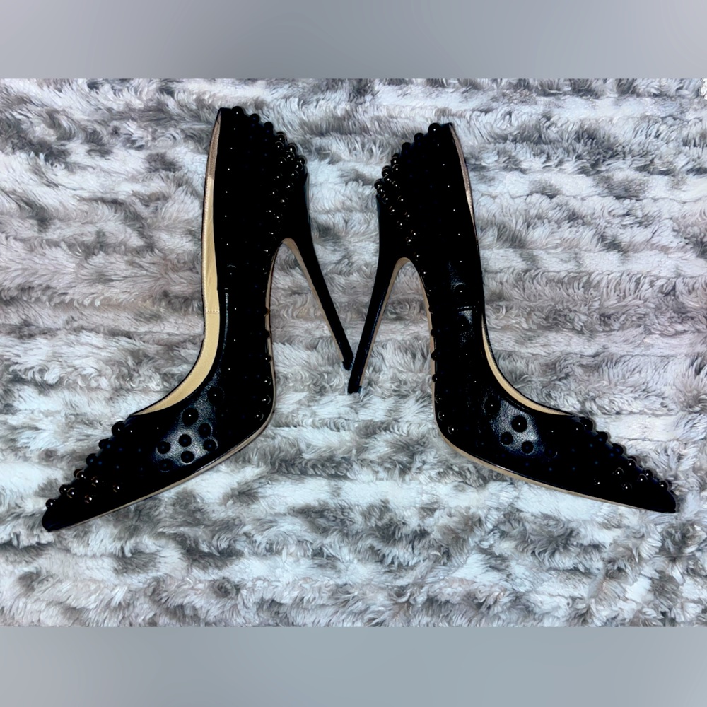 New!! Beautiful, edgy Jimmy Choo pumps. Can be worn dressed up or down.
